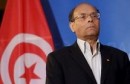 Tunisia's President Moncef Marzouki listens his national anthem at the European Parliament in Strasbourg, February 6, 2013.  REUTERS/Jean-Marc Loos (FRANCE - Tags: POLITICS)